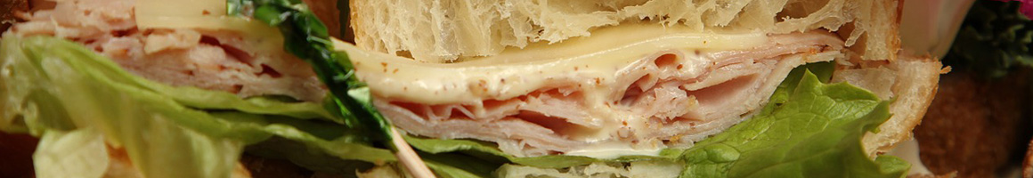 Eating Sandwich at Commerce Street Creamery Cafe Bistro restaurant in Centreville, MD.